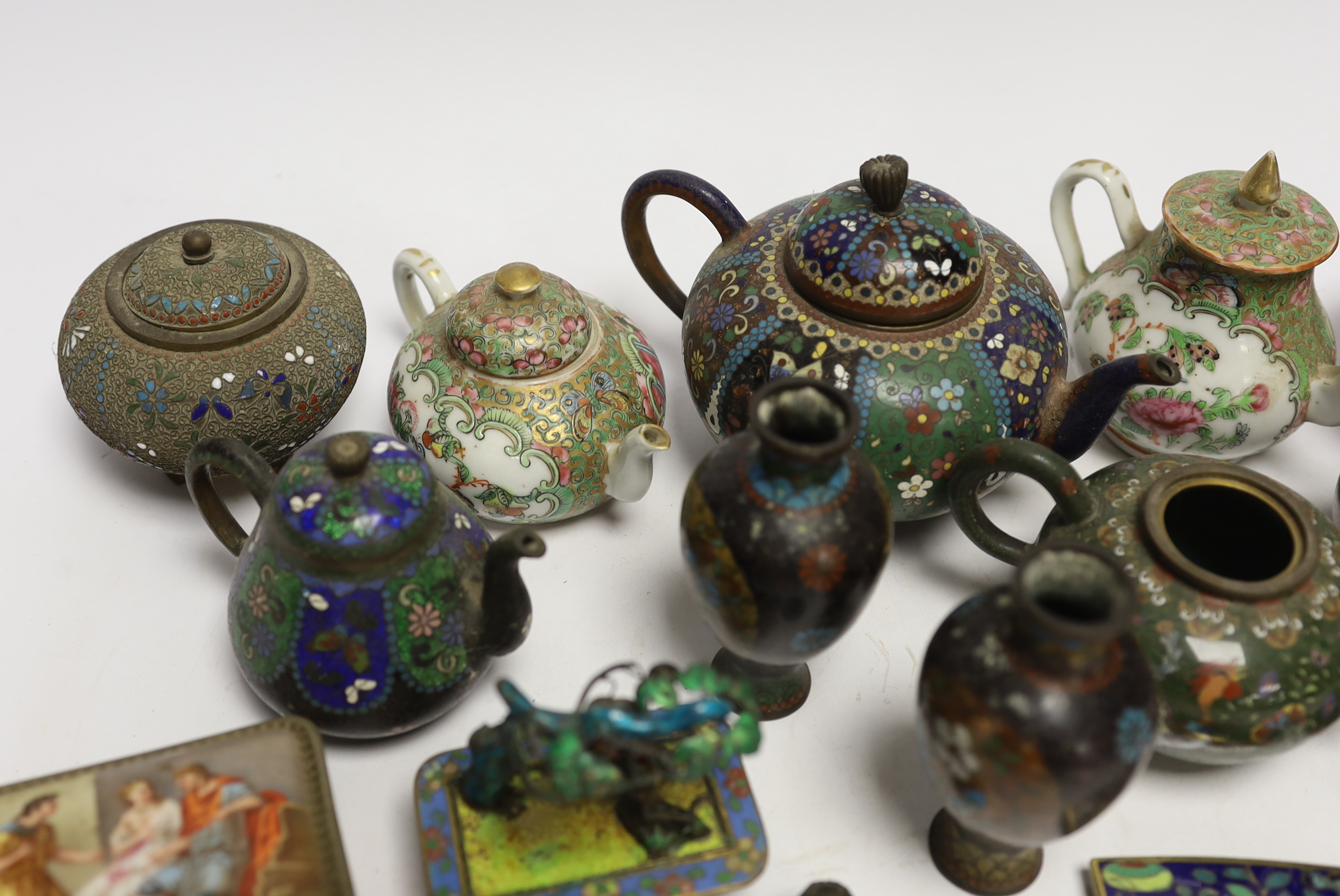 Two miniature Cantonese porcelain teapots, and a small collection of Chinese and Japanese cloisonné and champlevé enamel wares (12)